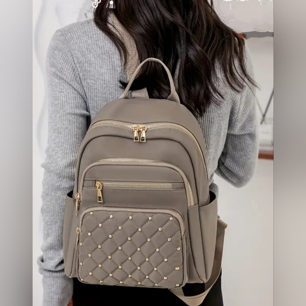 New in package quilted zipper backpack purse hold studded